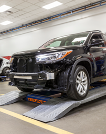 Toyota on vehicle lift | Platinum Toyota of Texoma in Denison TX